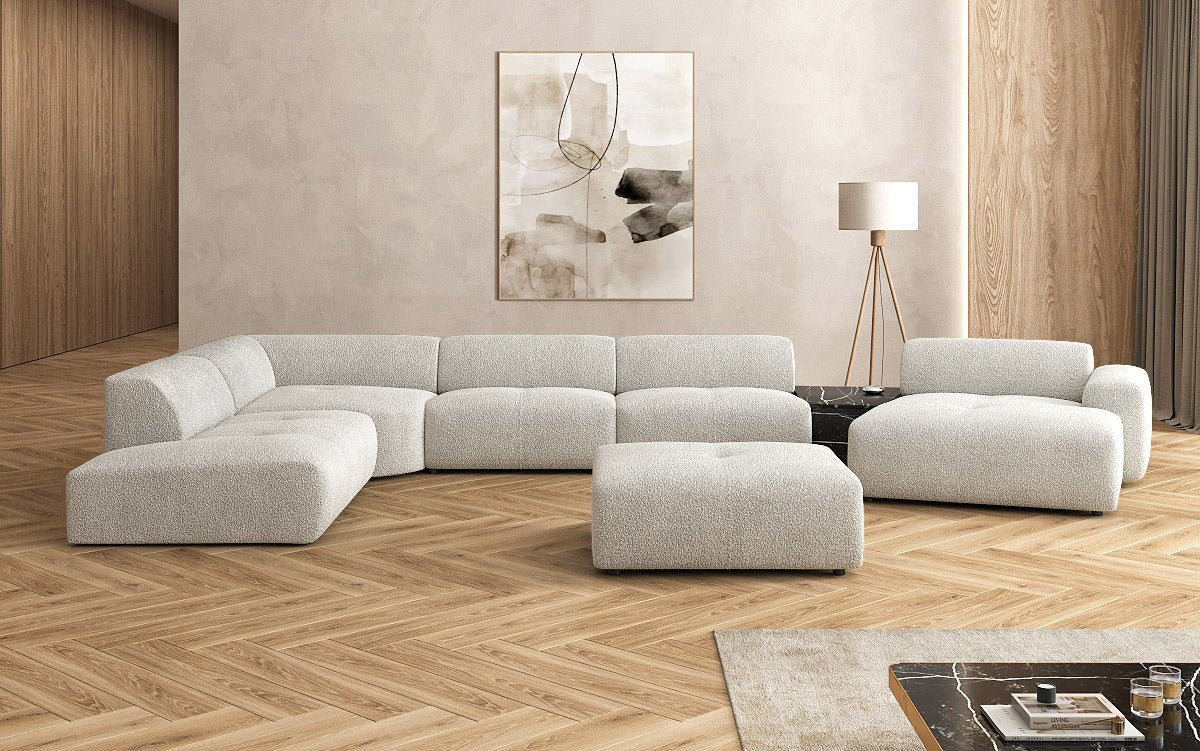 Designer Wohnlandschaft Calm mit Beistellhocker in Bouclé