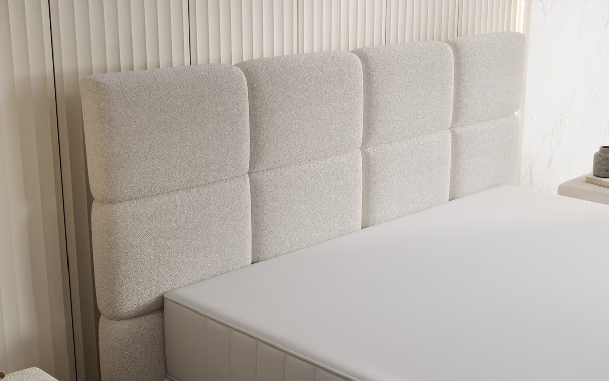 Boxspringbett Nessa mit hohen Füßen in Teddy Bouclé