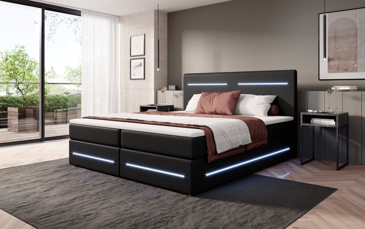 Boxspringbett Evelyn mit Stauraum und LED (Kunstleder) - Luxusbetten24