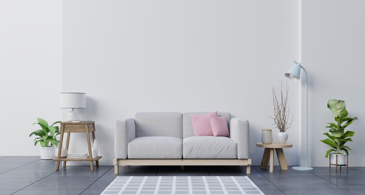 Welche Farbe passt zu einer grauen Wand im Wohnzimmer? - Luxusbetten24