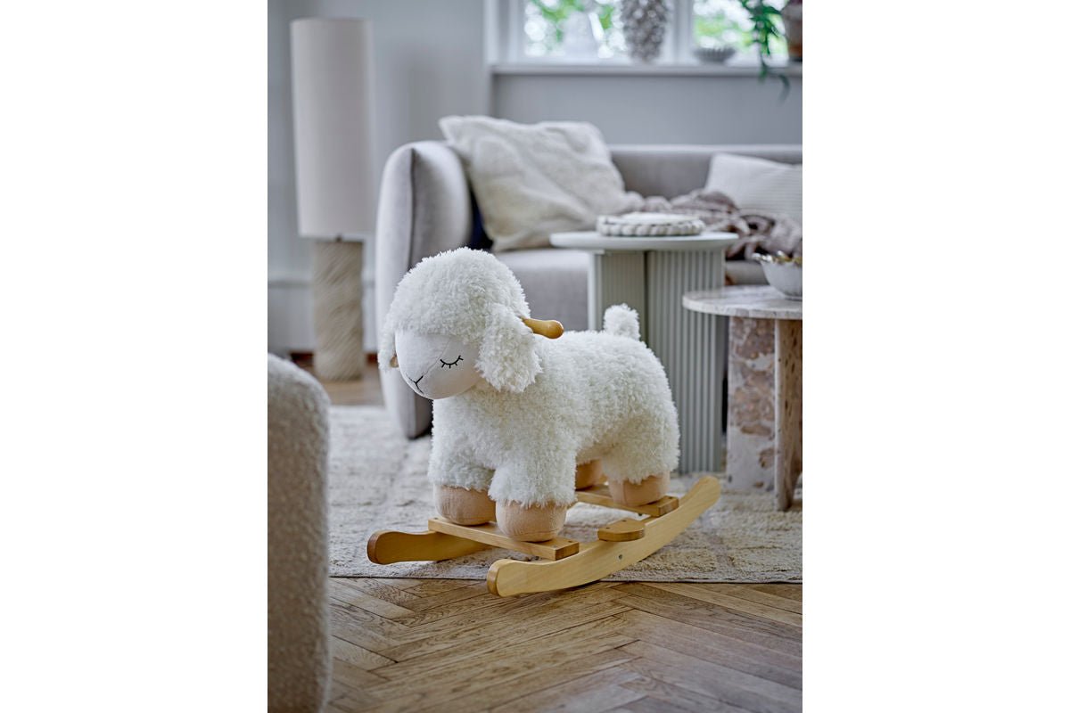 Schaukelspielzeug Salome – flauschiges Schaukeltier aus Holz für Babys & Kinder
