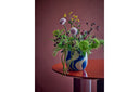 Esstisch Rufia – Skulpturales Design in Rot