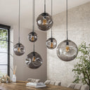 Pendelleuchte Zephyra – 6 Leuchten im Rauchglas Design mit organischem Deckensockel