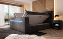 Boxspringbett Sejour mit TV Lift, RGB und Stauraum in Cord