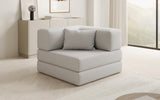 Designer Sofa-Sessel Lazy in Bouclé