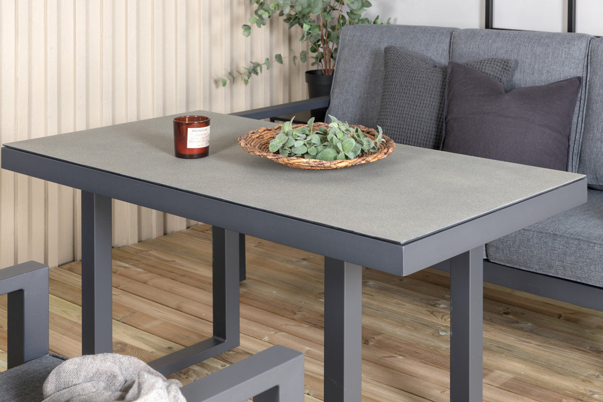 Garten Loungeset Kreta – 4-teiliges Set mit Tisch & dunkelgrauen Kissen
